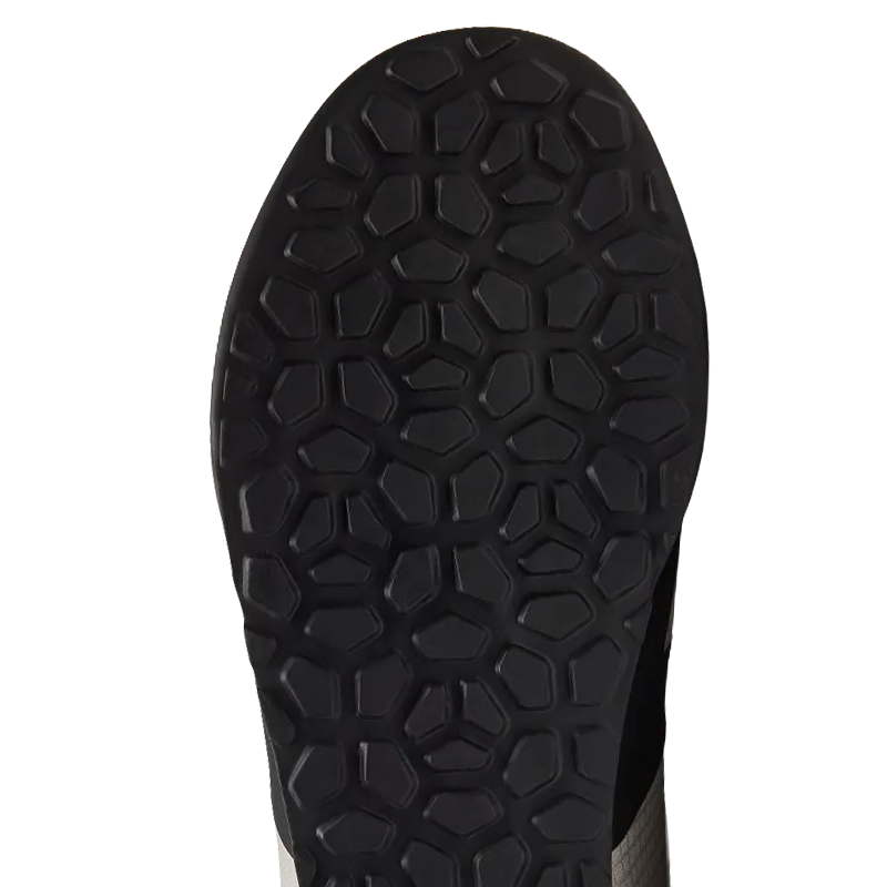 Flat-pedal mountain bike shoe sole with sticky rubber tread and no cleat